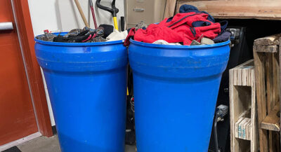 Containers Filled with donated winter clothes