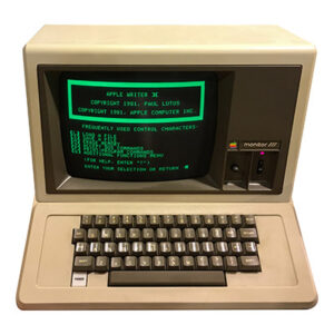 The Apple lle computer with Rent Manager Property Management Software on the monitor.