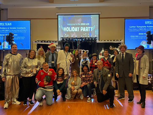 LCS Employees at the Holiday Party dressed up as the characters of National Lampoon's Christmas Vacation