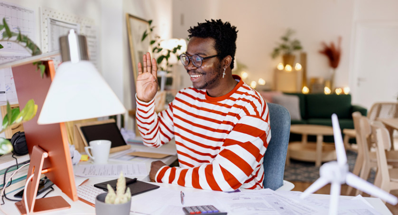 A man working with a hybrid work schedule