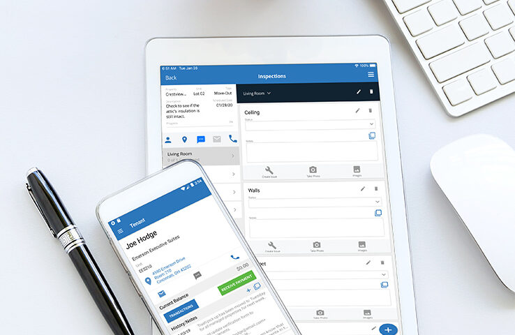 Phone and Tablet next to pen with Rent Manager pulled up