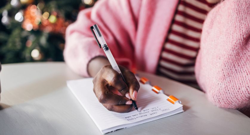 Woman making new year's resolutions