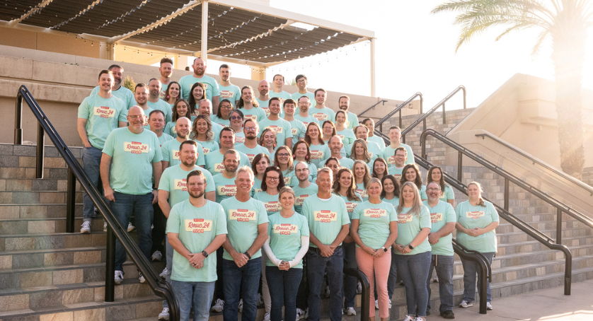 RMUC and Rent Manager employees smile at RMUC.24.