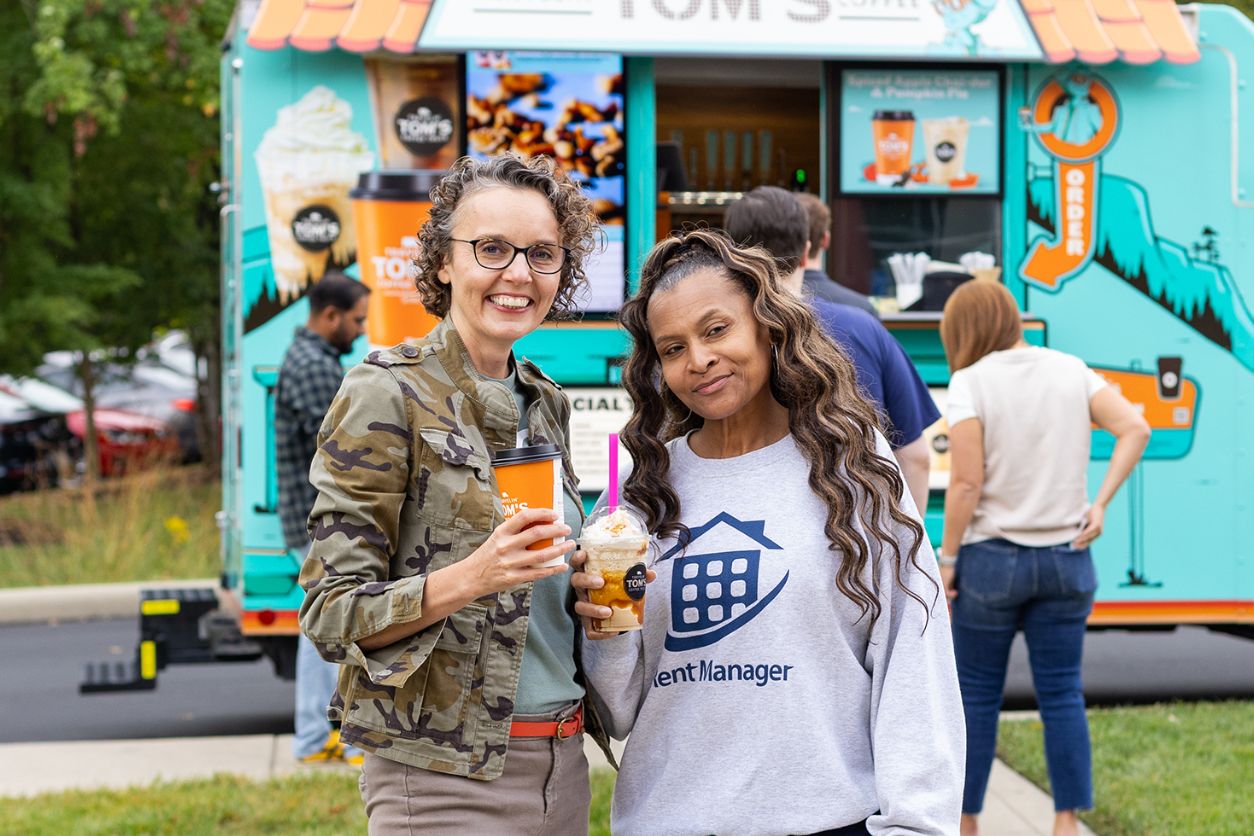LCS Employees Posing with Coffee