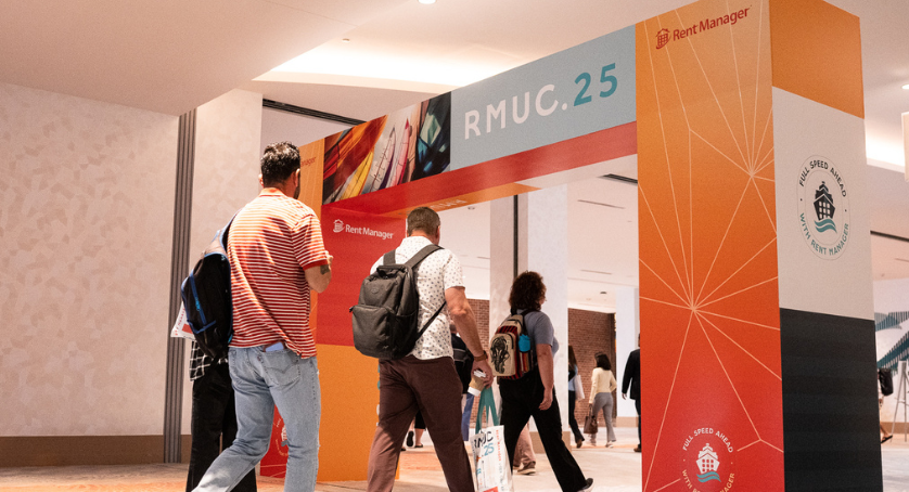 Property managers and attendees walking into the Rent Manager User Conference,